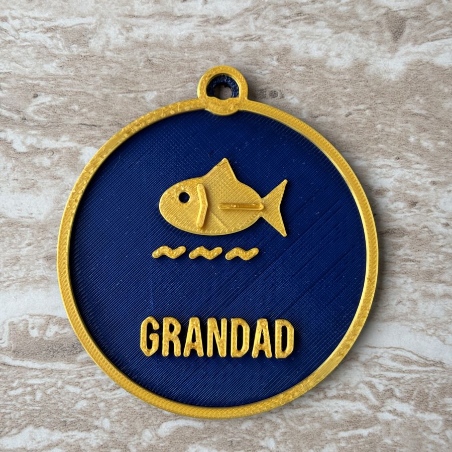Personalised fishing ornament with a fish and the name GRANDAD