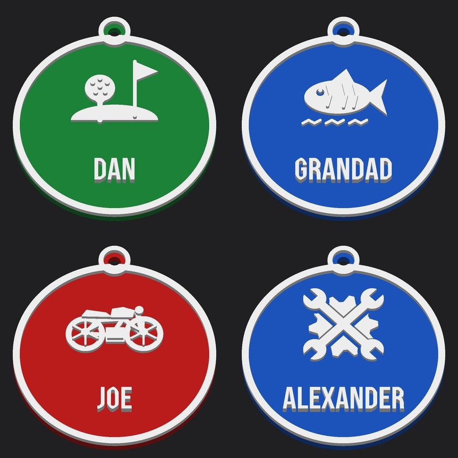 Four personalised hobby ornaments in green, blue and red: golf DAN, fishing GRANDAD, motorbike JOE, mechanic ALEXANDER